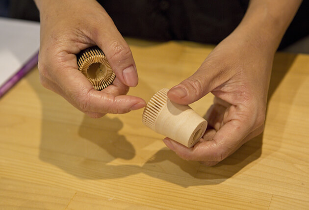 The rings with many incisions are made from the wood of egonoki trees in the Nagara River basin